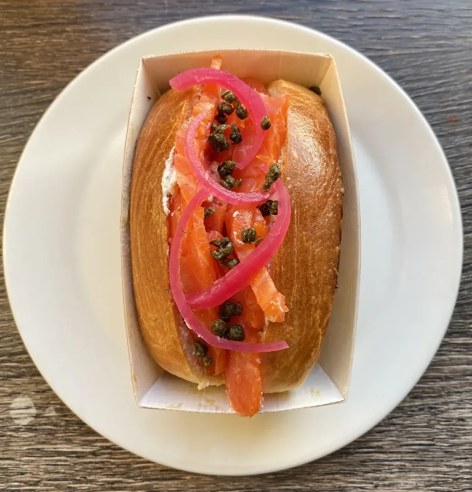 Salmon bagel with pickled onions and capers